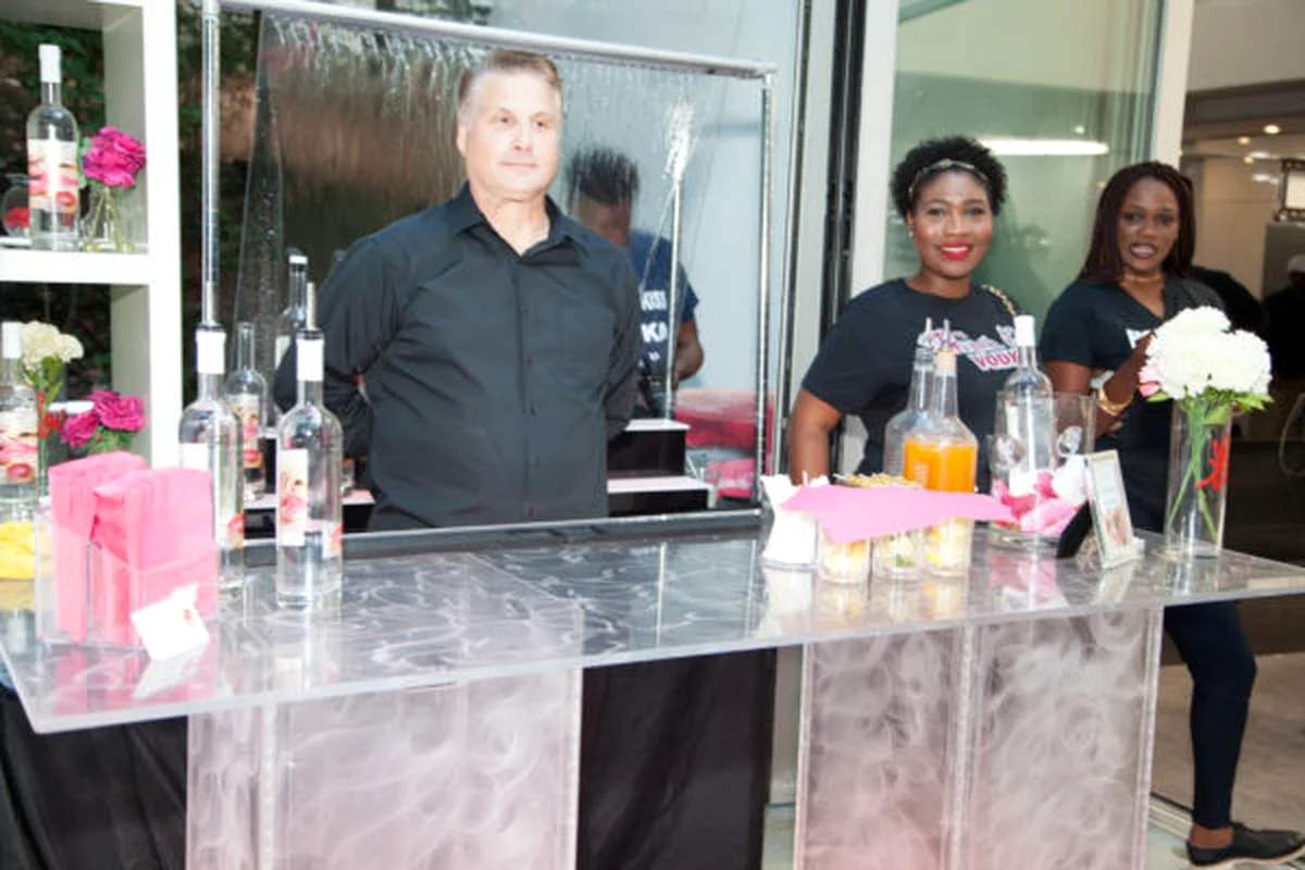 Fires Bartending team behind a clear event bar