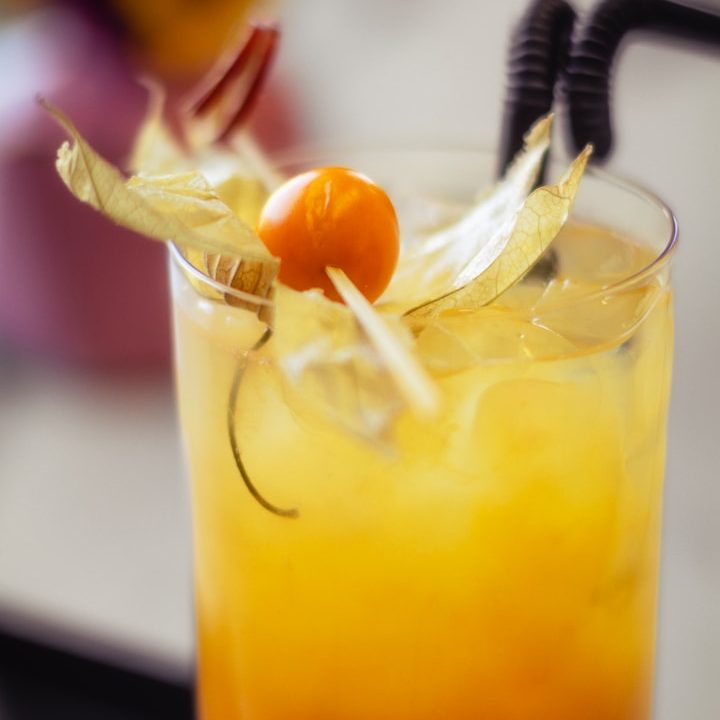 A vibrant golden handcrafted cocktail
