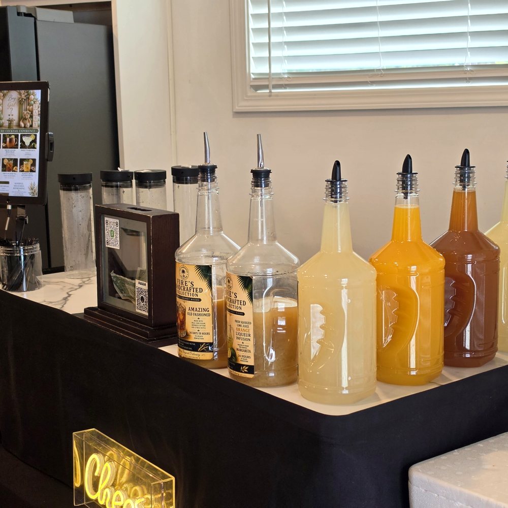 A lineup of handcrafted Fires Bartending signature mixers
